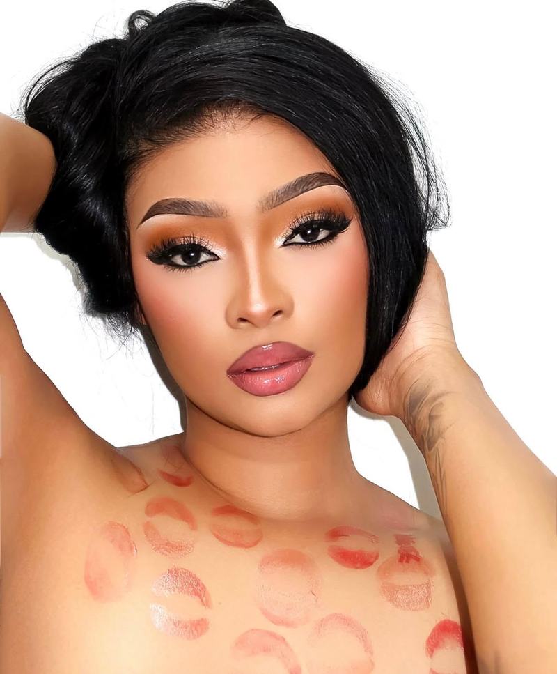 Model wearing N Cosmetics gloss with lip prints