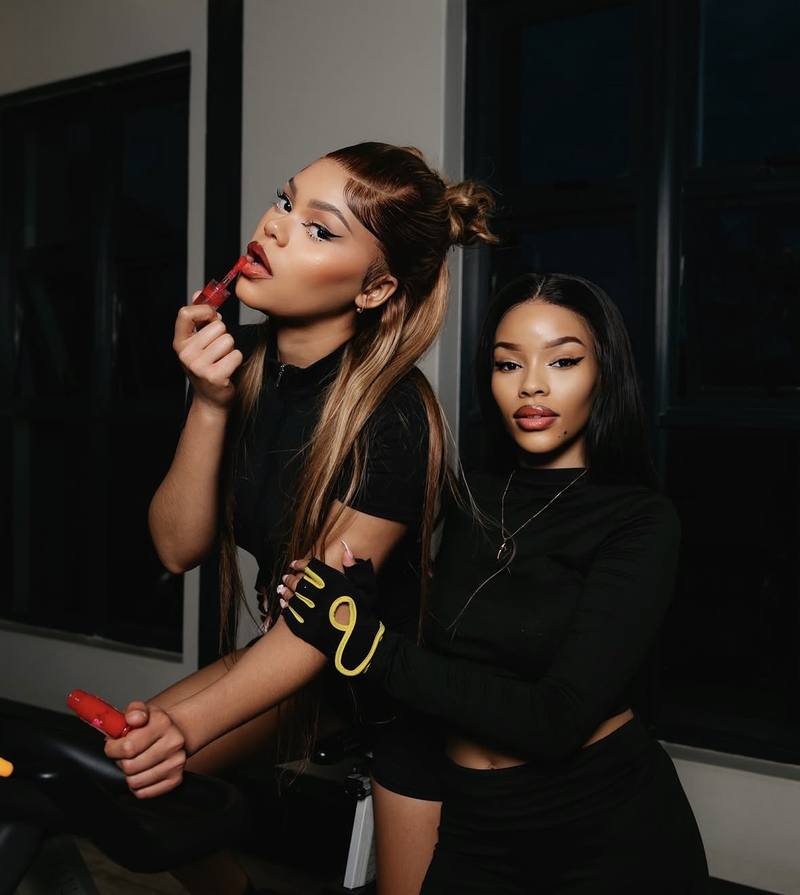 Two models applying gloss